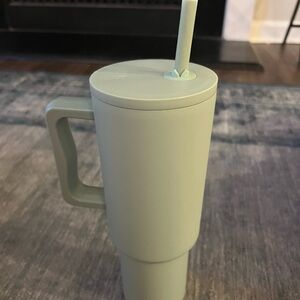 Simple modern tumbler in light green. Unused. See pic for scuff marks